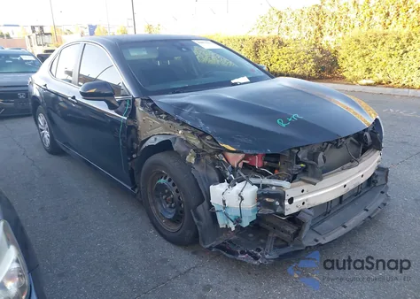 2018 Toyota Camry Hybrid Le z USA, uszkodzony, nr VIN 4T1B31HK9JU502572